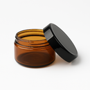 Frasco PET âmbar cosmético 100 gramas com tampa preta aberto