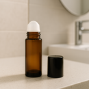 rollon de vidro 50 ml âmbar para desodorante big rollon  no banheiro